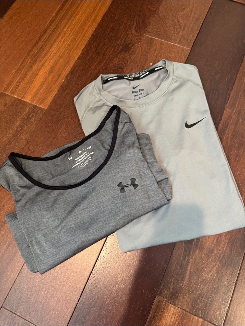 Nike and Under Armour bundle of athletic shirts XL, gray color